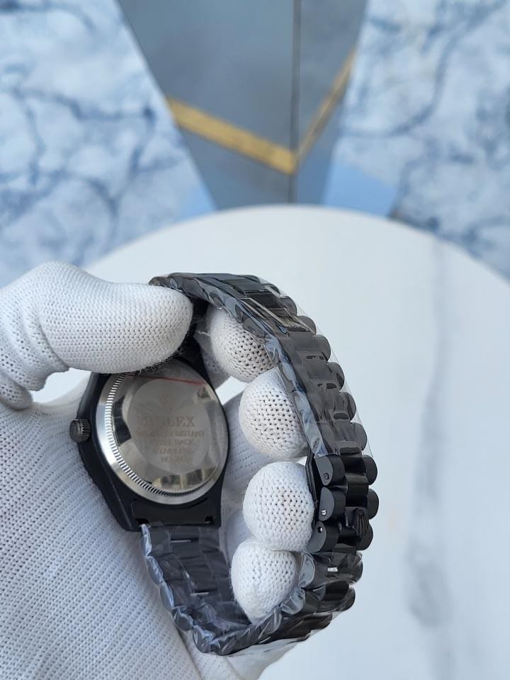 ROLEX_DAYDATE_BLACK_GREEN_DIAL_AT334