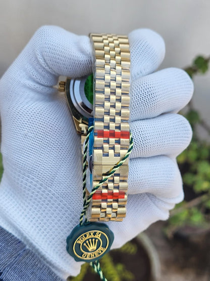 ROLEX_JUST_DATE_GOLD_GREEN_DIAL_AT294